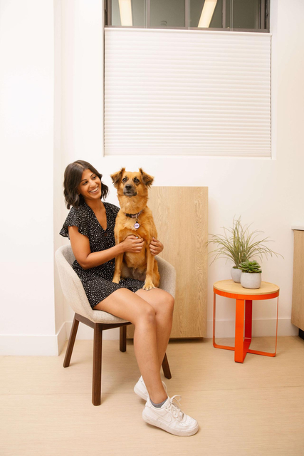 Member and her dog in the examining room